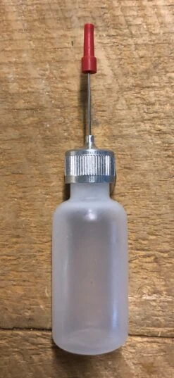 Wapsi Applicator Glue Bottle: Empty, Loaded With Fly Head Cement, Flex-Seal, Gloss Coat Head Cement
